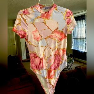 Multiple bodysuits all worn once or new without tags